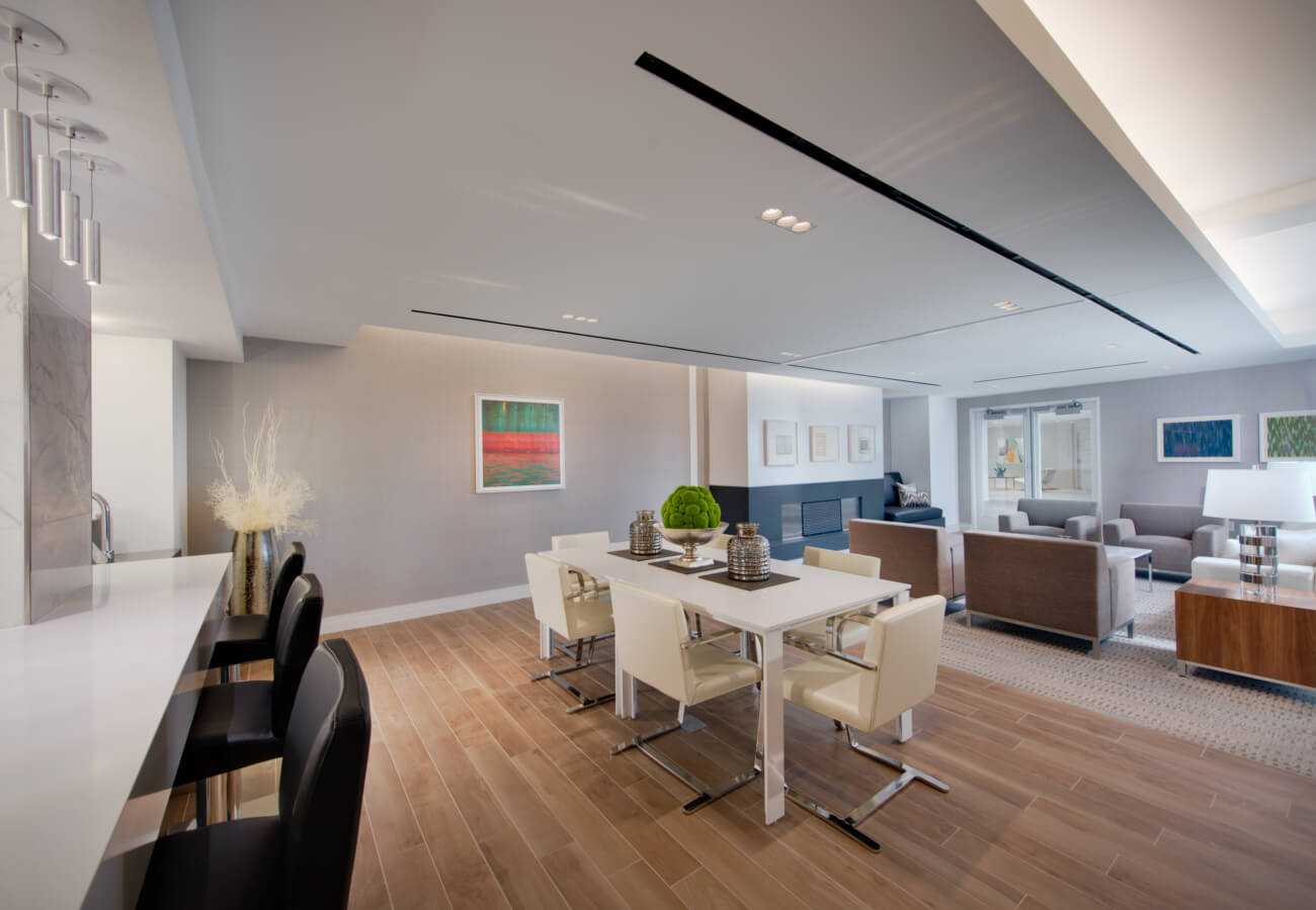 Clubroom kitchen and dining area at Fifty Three Thirty Three Apartments with lounge seating and modern finishes.